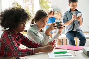 students playing on phones